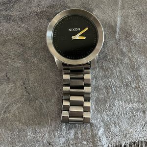 Men’s Nixon watch.